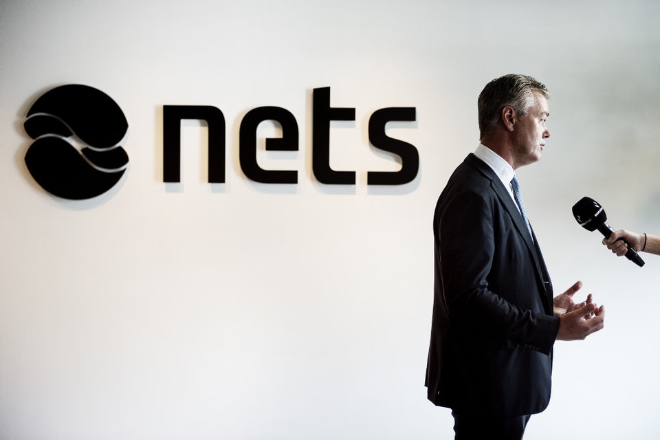 Nets skal have fjernet en række dobbelt-funktioner som følge af en række opkøb, og derfor bliver der 500 færre stillinger. Her ses topchef Bo Nilsson fra da Nets skulle på børsen. (Arkivfoto)
